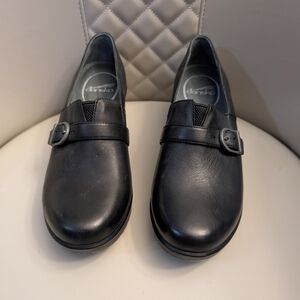 Brand New Dansko Size 38/7.5 Black Leather Slip-On Shoes with Buckle